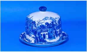 Blue And White Cheese Dish And Cover. Decorated with outdoor scene in blue and white colour way.