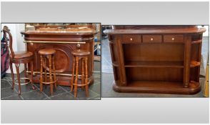 Reproduction Mahogany Contemporary Bar And Bar Back. The bar has a pink marble shaped top with