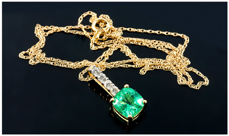 18ct Yellow Gold Set Columbian Emerald and Diamond Pendant Drop. Fitted on a 18ct gold chain. The