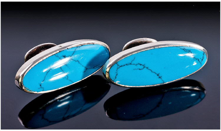 A Pair of Marquise Shaped Silver and Turquoise Matrix Cufflinks. Fixed links and fastenings.