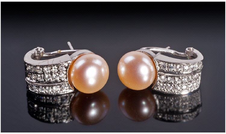 18 Carat White Gold Set Pair of Diamond and Pearl Earrings. c 1920`s. The cultured pearls of good