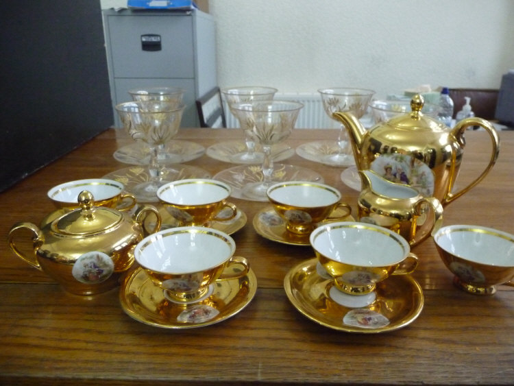 Bavarian Gilt Tea Set with Traditional Scenes to the Front. Together with a set of 6 Victorian