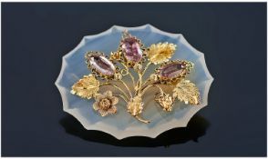 Ladies 9ct Gold and Pale Blue Glass and Amethyst Set Floral Brooch. 1.5 Inches Diameter. Tests 15