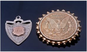 United States Silver Dollar Date 1879. Excellent condition set within a silver mount/brooch. Plus a