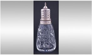 A Silver Topped and Banded Cut Crystal Sugar Sifter. Hallmarked Birmingham 1998. 6.5 inches high.