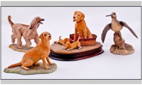 Border Fine Arts Handmade Dog Figures. 1). Mother with pups raised on mahogany platform. Signed D.