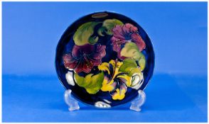 Moorcroft Footed Bowl. ` Hibiscus ` Pattern on Blue Ground. Signed to Base. Overall Good Condition.