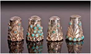 Four Silver Thimbles, each set with cabochon turquoise. Test silver and probably Mexican or