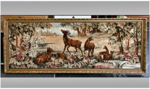 Large Framed Tapestry. Scene depicts Deer in Forest Setting. Gilt Frame. 75 by 32 inches.