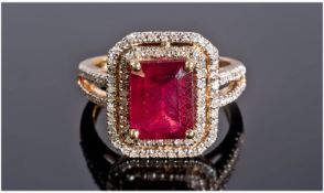 14ct Yellow Gold Diamond & Ruby Ring, Set With A Large Central Emerald Cut Ruby (Estimated Weight