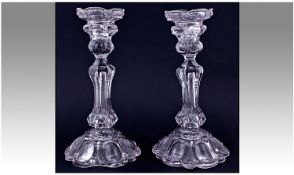 Pair Of Victorian Pressed Glass Candlesticks, on petal shaped bases and baluster stem. Height 10