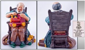 Royal Doulton Figure `The Toymaker`. HN 2250. Issued 1959-1973. Designer M Nicol. Height 6 inches.