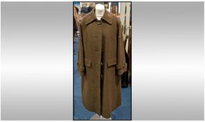 Long Ladies vintage Aquascutum Waterproof Coat size 16 to 18,  toggle fastening, fully lined. Label