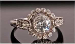 White Gold Diamond Ring, The Central Round Brilliant Cut Single Stone Surrounded By 12 Millegrain