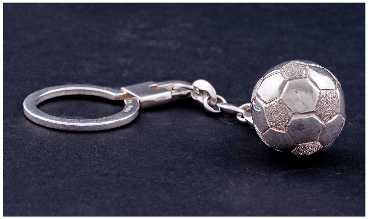 Football Interest. A Silver Key Ring featuring a realistic football. London import mark by S.W.P