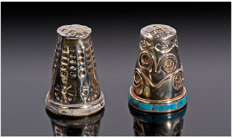 A Pair of Silver Thimbles, one with a rim set with Abalone Shell and the other with a turquoise set