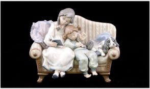 Lladro Figure ` Big Sister ` Model No.5735. Mint Condition. 6.5 inches high and 8.25 inches wide.