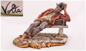 Capo Di Monte Fine And Early Signed Figure. Tramp on bench with birds. Signed Volta. 7.75 inches