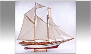 Model Yacht On Wooden Stand. Plaque on stand reads `Belle Poule`. Height 30.5 inches, width 35.5