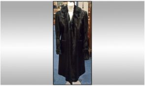 Black Calf Fur and Leather Full Length Coat, stylish and well made with smooth and glossy skins,