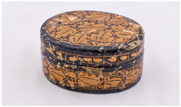 19th Century Oval Shaped Lidded Paper Mache Box. 1.5 inches high and 3 inches diameter.