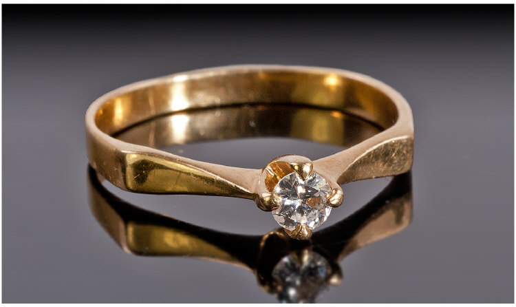 18ct Gold Diamond Solitaire, Set With A Round Modern Brilliant Cut Diamond, Unmarked, Ring Size Q.