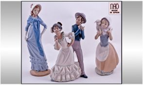 Nao By Lladro Figures ( 3 ) In Total. 1/ Spanish Dancers, 10.75 Inches High. 2/ Girl Carrying a