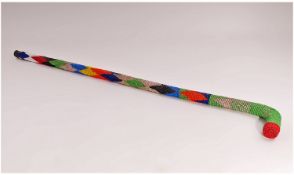 Colourful Patterned African Bead Walking Stick. Length 32.25 inches. Good condition.