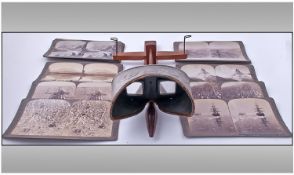 Stereoscope Viewer together with a selection of cards. Including various views of Africa, Jamaica,