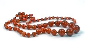 Strand Of Amber Coloured Graduating Glass Beads, Length 32 Inches, Early 20thC