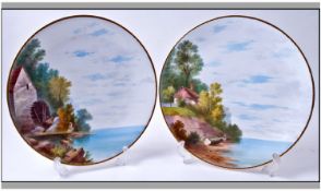 Pair of Minton Cabinet Plates, hand painted `Remote Lakeside Scene`. 9.5 inches in diameter.