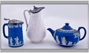 Wedgwood Blue and White Jasper Ware Teapot, a hot water jug with a plated lid and a white pottery