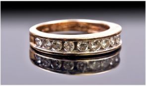 9ct Gold Channel Set Diamond Ring, Set with 12 Brilliant Cut Diamonds. Est 1ct. And Fully