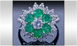 18ct White Gold Diamond And Emerald Cluster Ring, Central Round Modern Brilliant Cut Diamond