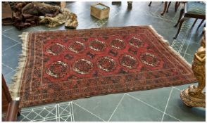 Antique Caucasian Tekke Style Carpet with a central panel with ivory and red decorations. With gull