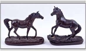 Pair Of Metal Horse Figures On Oval Bases. One 6 inches high, 7 inches wide, the other 6.75 inches