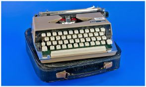 Portable Typewriter `Boots, Nippo 200` with case.