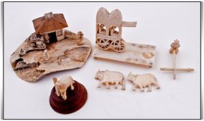 Three Pieces Of Ivory. Comprising; 1, Japanese style house with figure. 2, small Indian elephant