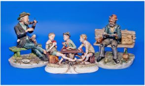 Three Capo Di Monte Figures. 1, Three boys card players, 5.25 inches high, 8 inches wide. 2, Tramp
