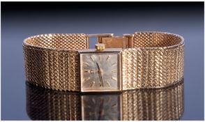 Omega Fine Ladies 9ct Gold Cased Wrist Watch, with integral 9ct gold fine mesh bracelet. Fully