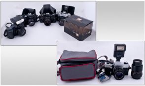 Collection Of Assorted Vintage Photography Cameras. Five with leather cases, one boxed and one in