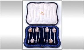 A Silver Set of Six Apostle Teaspoons and Matching Sugar Tongs (7) pieces in total. In original