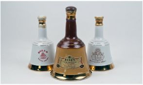 Three Bottles Of Bell`s Scotch Whiskey, with bottles in the form of bells. Unopened and unused.
