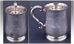 Silver Tankard of plain form and scroll handle, Hallmark Birmingham. 3.75 inches high. 117.2