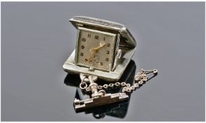Art Deco Swiss Travelling Clock, Of Square Form, The Leather Clad 37mm Hinged Case Opens To Reveal