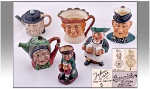 Collection Toby Jugs And Teapots, 6 In Total. Comprising Royal Doulton, Beswick And Sylvac items.