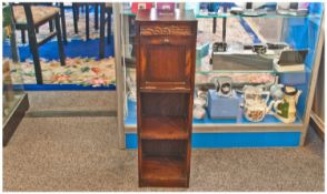 Oak Cased 1920`s Combined Smokers Cabinet And Shelves. With carved top and pull down door, fitted