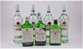 Seven Bottles Of Unopened Alcohol Bottles. Four bottles of Bacadi Superior, two bottles of Gordon`s