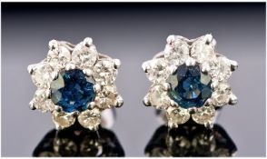 18ct Gold Set Pair of Sapphire and Diamond Earrings, with Flower Head Cluster Design. Est 50pts.