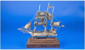 Early Chinese 20th Century Silver Model of a 19th Century Chinese Junk/Boat. Raised on a Wooden